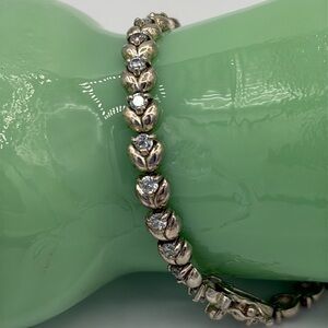 FAS Sterling silver bud tennis bracelet with bright white CZs.